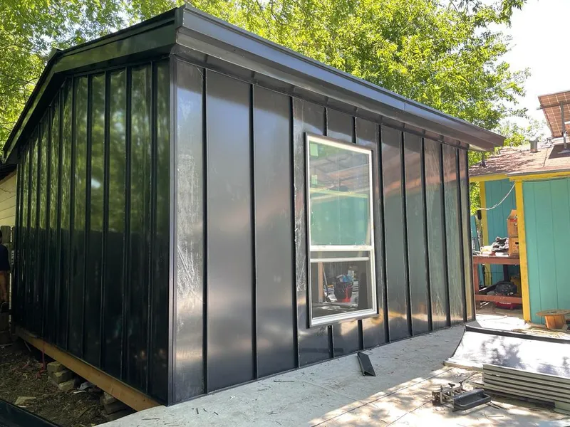 Black standing seam metal wall panels for Metal Roof Installation in Galveston